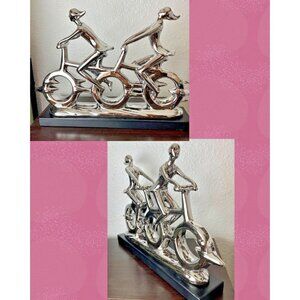 Uma Metallic Polished Finish Double Riding Bicycle Motif Statue